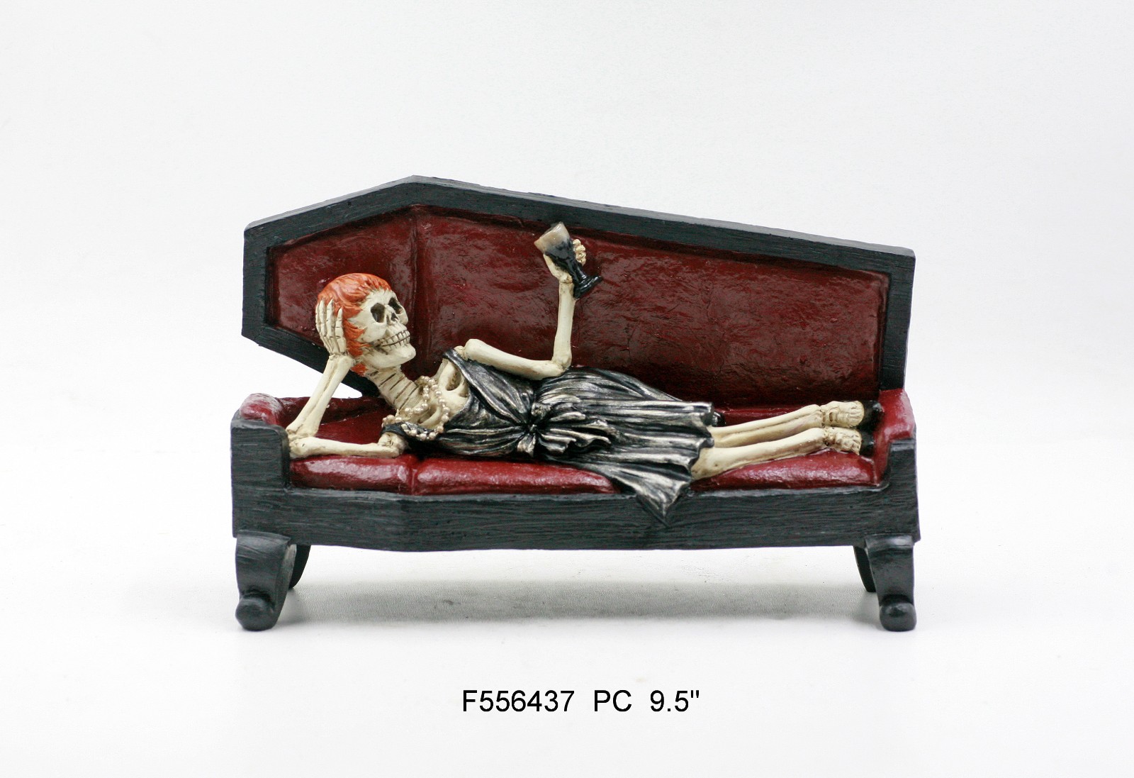 Resin skeleton in coffin decor